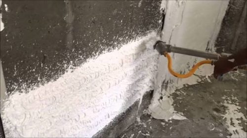 spraying gypsum